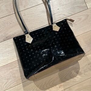 Arcadia Black Shoulder Bag with Glossy Finish and Textured Pattern